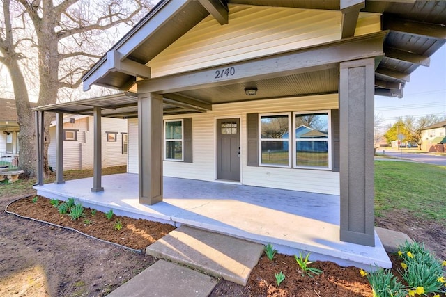 entrance to property with covered porch