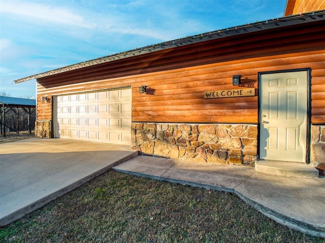 property entrance featuring a garage