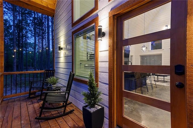 wooden terrace featuring a porch