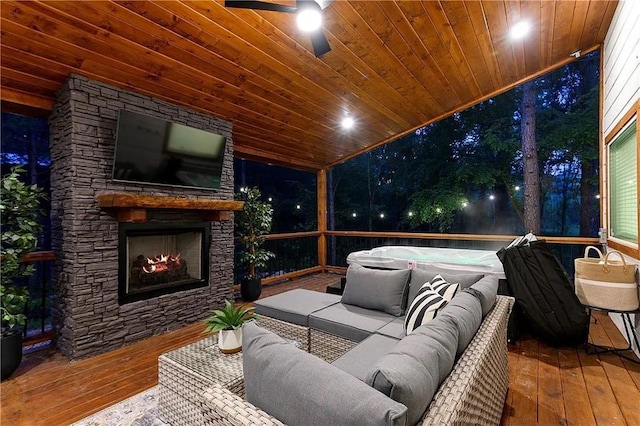 interior space featuring an outdoor living space with a fireplace