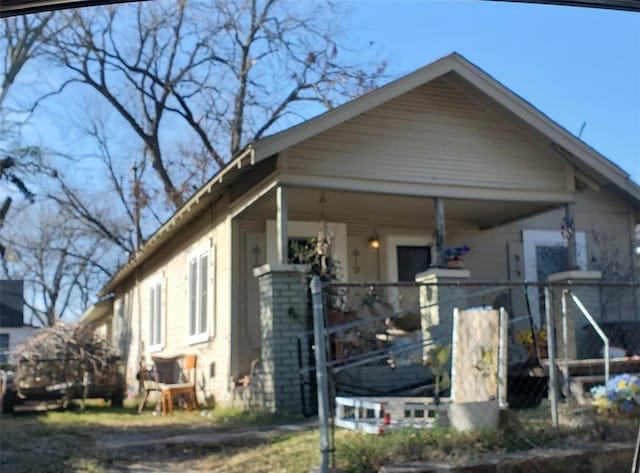 bungalow-style home with covered porch