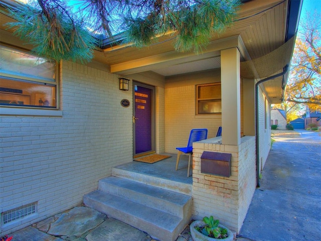 property entrance featuring covered porch