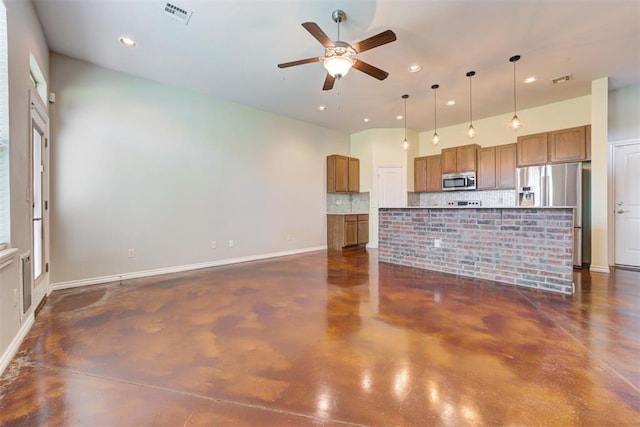 unfurnished living room featuring ceiling fan