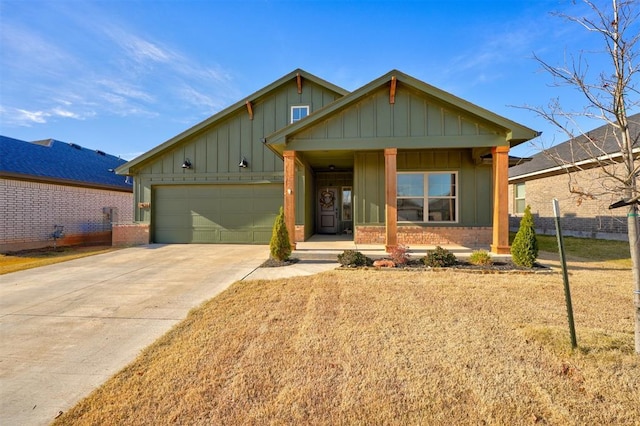 view of front of house featuring covered porch and a garage