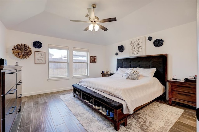 bedroom with hardwood / wood-style floors and ceiling fan