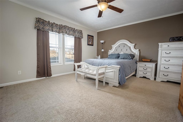 bedroom with ornamental molding, carpet flooring, and ceiling fan