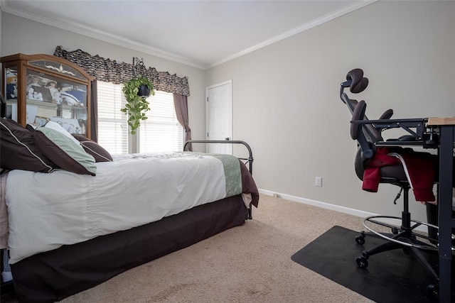 bedroom with ornamental molding and carpet floors