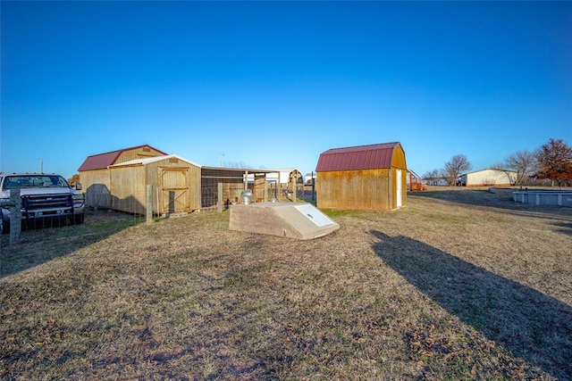 view of yard with a storage unit