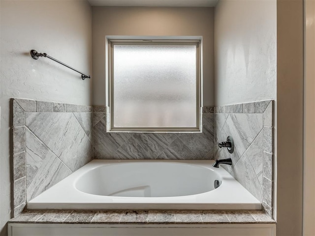 full bathroom featuring a garden tub