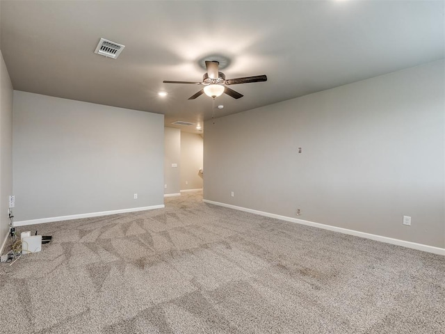 carpeted empty room with visible vents, recessed lighting, baseboards, and ceiling fan