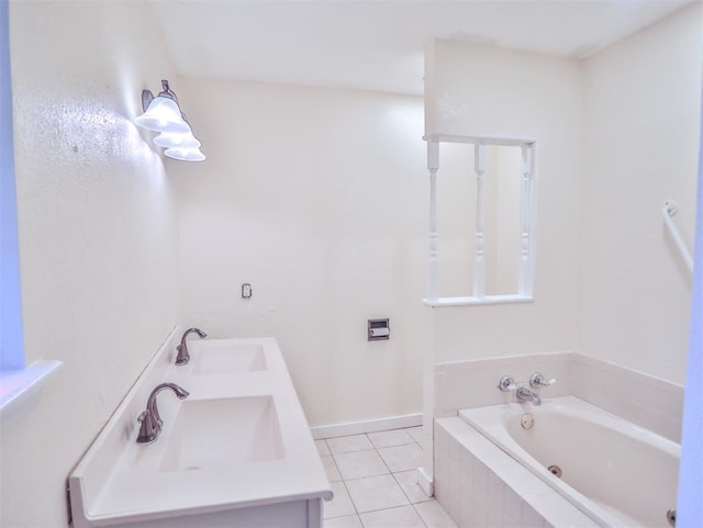 bathroom featuring tile patterned floors, vanity, and a relaxing tiled tub