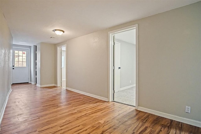 empty room with light wood-type flooring