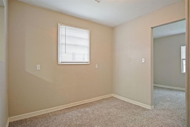 view of carpeted spare room