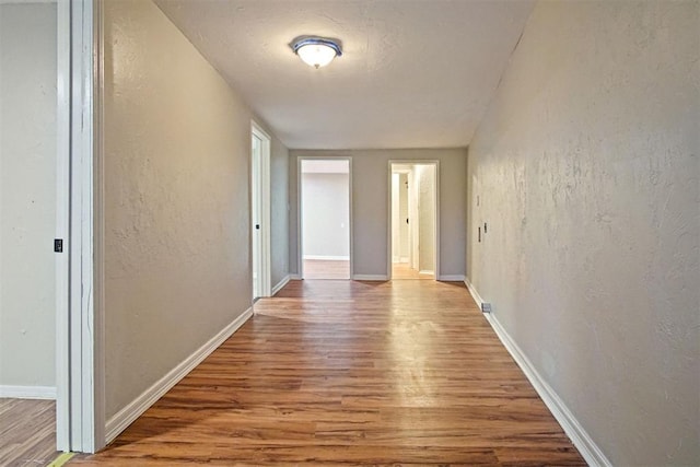 hall featuring hardwood / wood-style floors