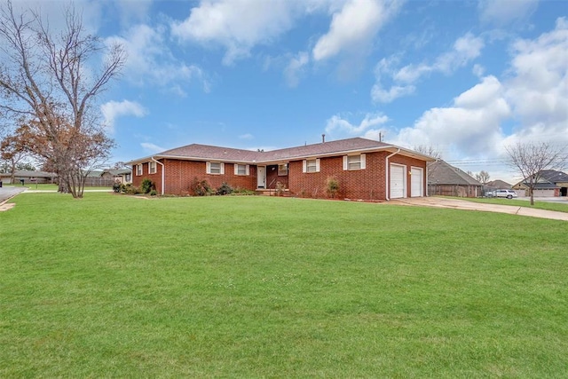 ranch-style house featuring a front lawn, a garage, brick siding, and driveway