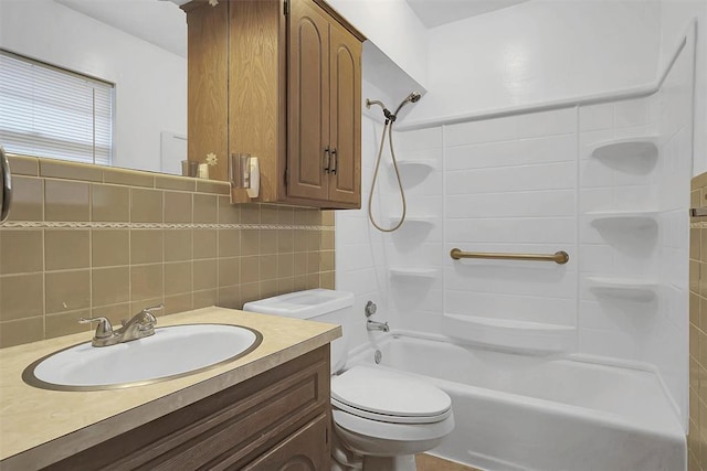 full bathroom featuring backsplash, shower / bath combination, vanity, tile walls, and toilet