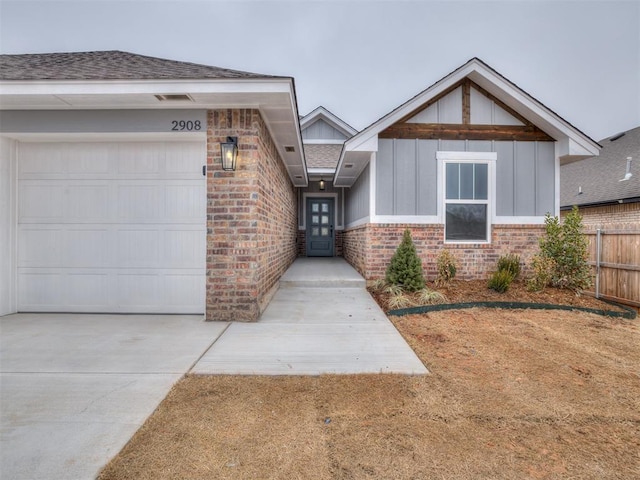 view of front of property with a garage