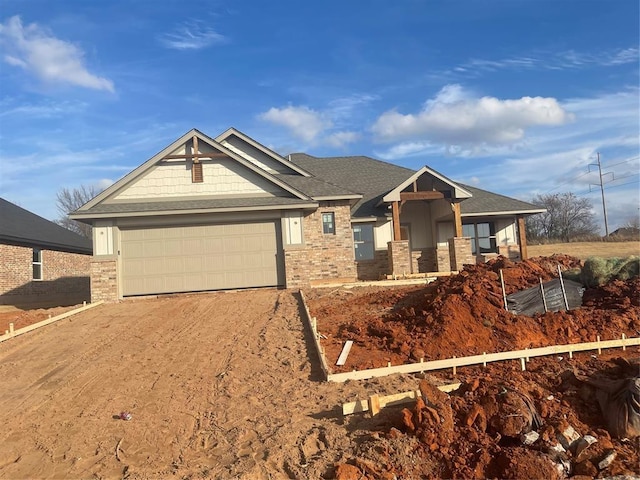 craftsman house with a garage