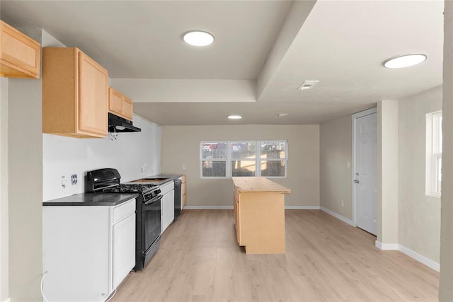 kitchen with exhaust hood, black appliances, light wood-type flooring, light brown cabinetry, and a kitchen island