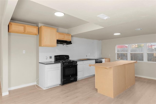 kitchen with light brown cabinets, a kitchen island, light hardwood / wood-style flooring, white cabinets, and black appliances