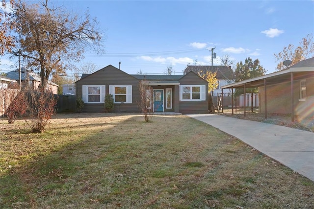 single story home with a front lawn