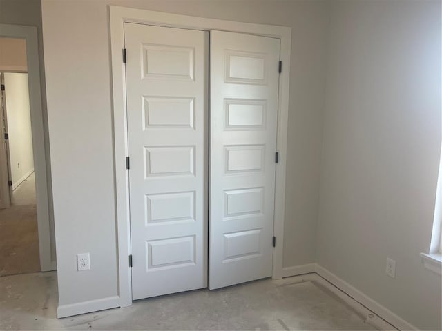 unfurnished bedroom featuring a closet