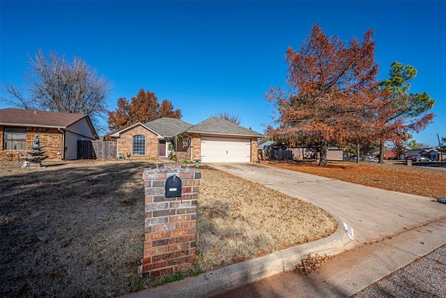 ranch-style home featuring a garage