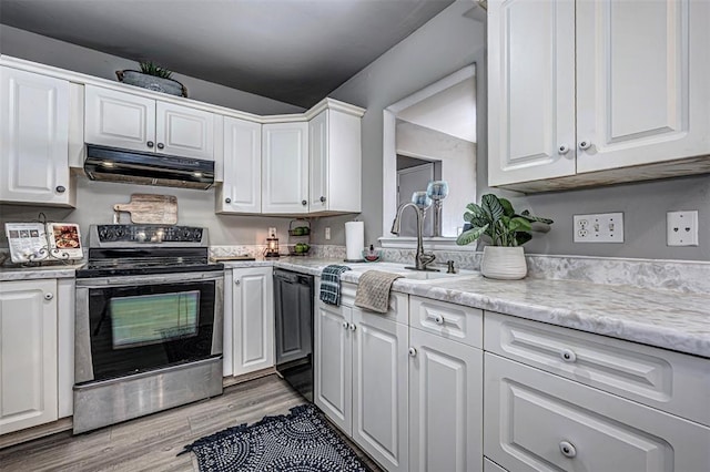 kitchen with electric range, dishwasher, sink, light hardwood / wood-style flooring, and white cabinets