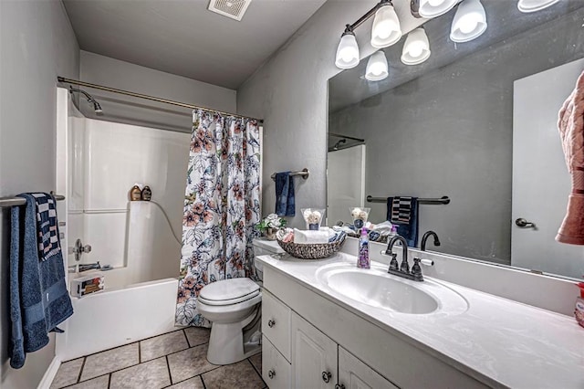 full bathroom featuring tile patterned flooring, vanity, toilet, and shower / bathtub combination with curtain