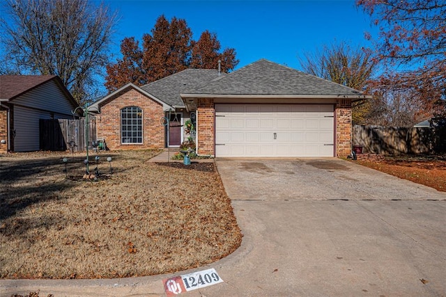 single story home with a garage