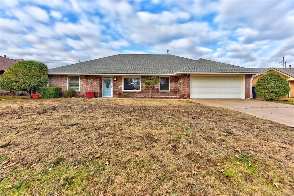 single story home featuring a garage