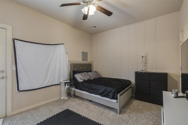 bedroom with ceiling fan and light colored carpet