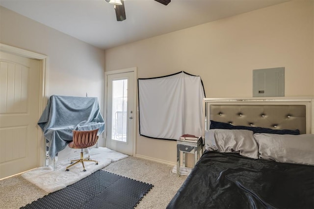 carpeted bedroom featuring multiple windows, ceiling fan, and electric panel