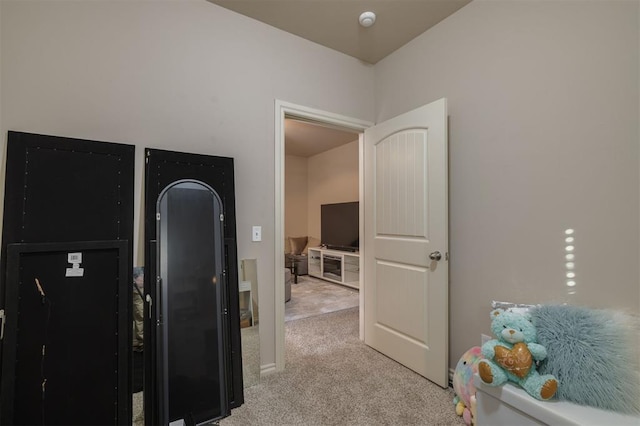 bedroom with light carpet