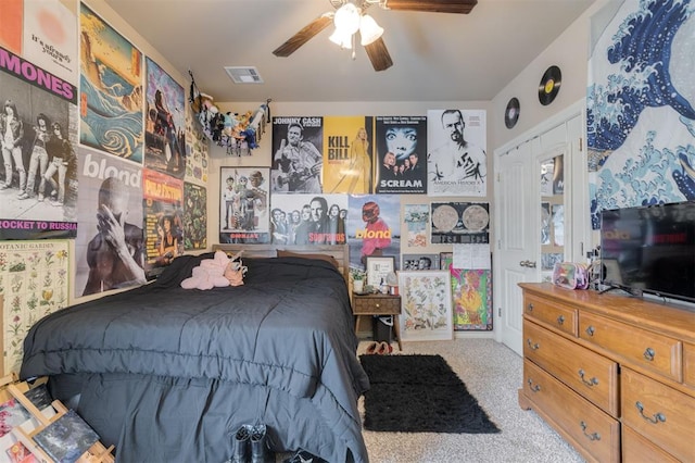 carpeted bedroom with ceiling fan