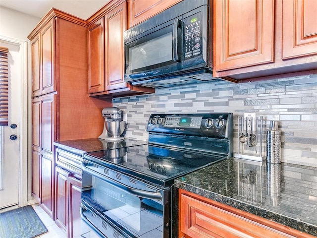 kitchen with light tile patterned floors, backsplash, and black appliances