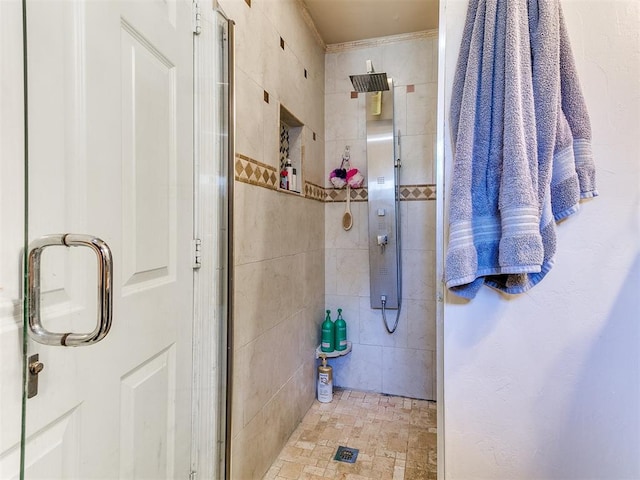 bathroom featuring an enclosed shower