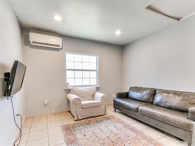 tiled living room featuring a wall unit AC