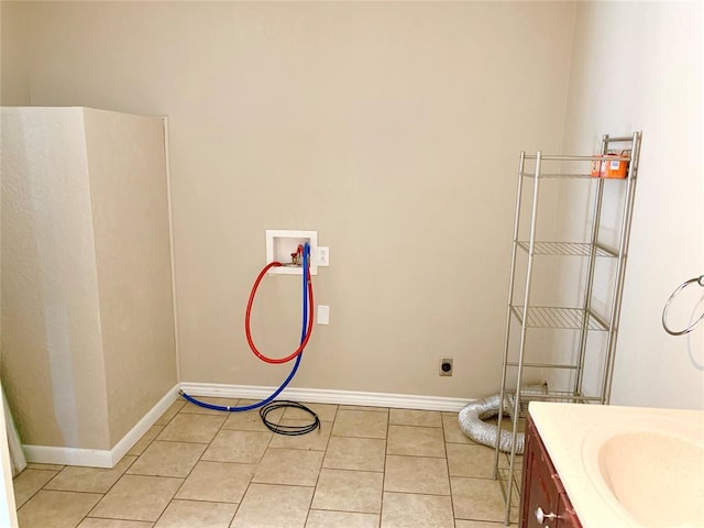 bathroom with vanity and tile patterned flooring