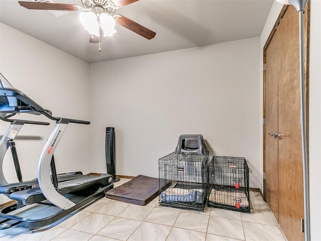 workout area with ceiling fan