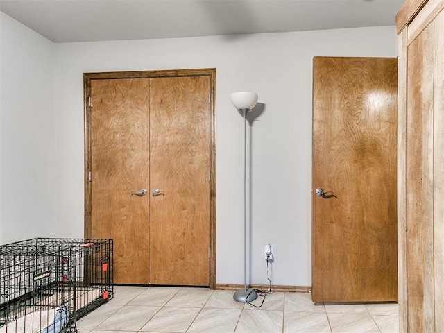 interior space featuring light tile patterned floors