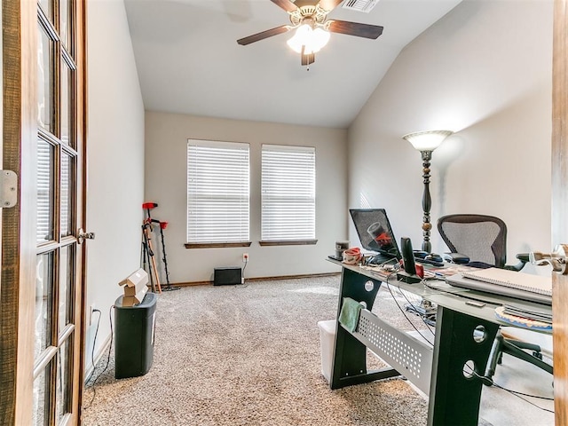 carpeted home office featuring ceiling fan and lofted ceiling