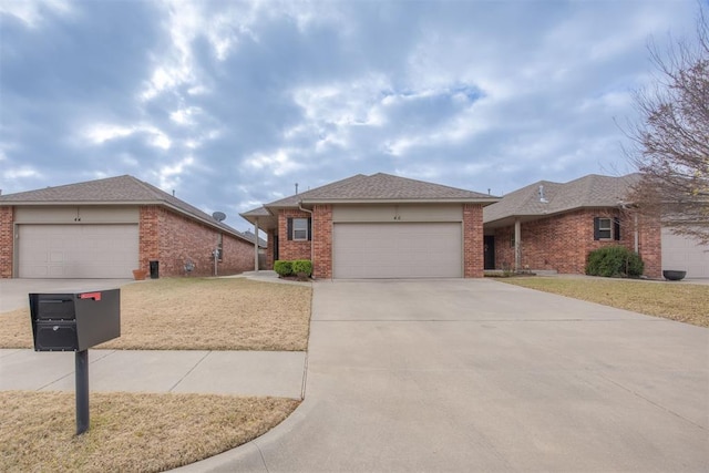 single story home featuring a garage