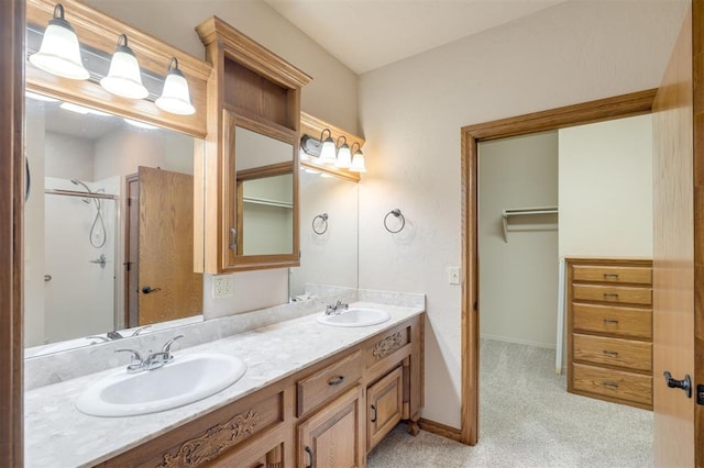 bathroom featuring vanity and walk in shower