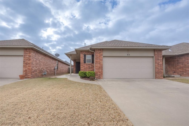 single story home featuring a garage