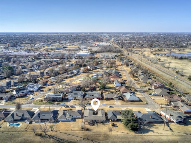 birds eye view of property with a residential view