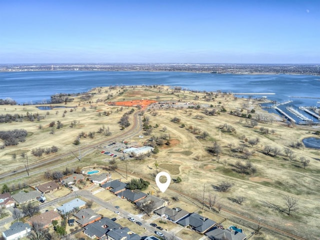 bird's eye view with a water view and a residential view