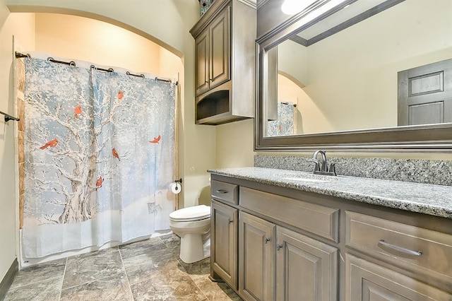 full bath featuring toilet, shower / bathtub combination with curtain, and vanity