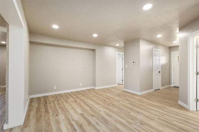 basement featuring light hardwood / wood-style flooring