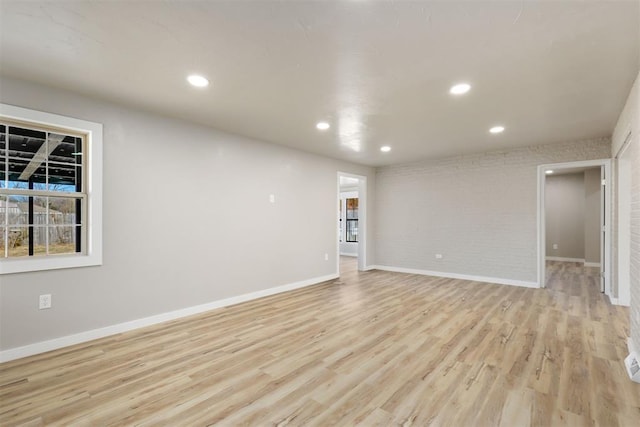 unfurnished room featuring light wood-type flooring